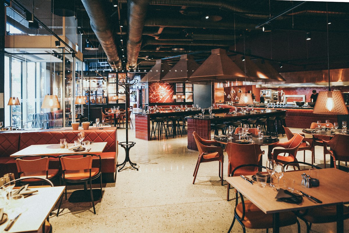 Dining room tables set for a group night